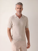 Man wearing the VAËL Alcázar rib-knit open-collar polo
