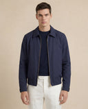 Man wearing the VAËL Ivō minimal zip jacket