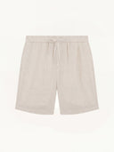 Man wearing the VAËL Soléo drawstring linen shorts