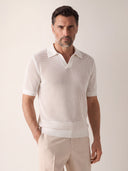 Man wearing the VAËL Sorélo open-knit polo in ivory