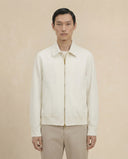 Man wearing the VAËL Ivō minimal zip jacket