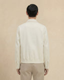 Man wearing the VAËL Ivō minimal zip jacket