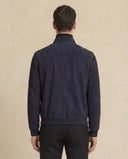 Man wearing the VAËL Köda suede bomber jacket
