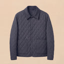 Man wearing the VAËL Tēron lightweight quilted jacket