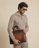 Man wearing the VAËL Vālen fine wool half-zip sweater