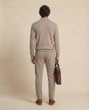 Man wearing the VAËL Vālen fine wool half-zip sweater