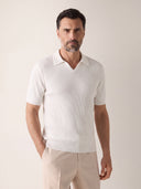 Man wearing the VAËL Alcázar rib-knit open-collar polo
