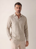 Man wearing the VAËL Solano open-collar linen shirt in beige