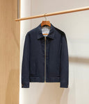 Man wearing the VAËL Ivō minimal zip jacket