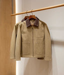 Man wearing the VAËL Cadré canvas workwear jacket with leather collar