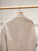 Man wearing the VAËL Auvēn quilted cashmere zip blouson