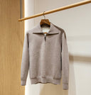 Man wearing the VAËL Vālen fine wool half-zip sweater