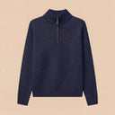 Man wearing the VAËL Caël ribbed half-zip wool sweater