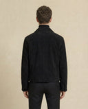 Man wearing the VAËL Draël velvet zip jacket