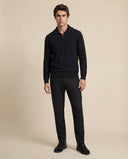 Man wearing the VAËL Vālen fine wool half-zip sweater