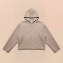 Man wearing the VAËL Sōva cropped wool zip hoodie