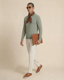 Man wearing the VAËL Solēn fine wool half-zip polo sweater