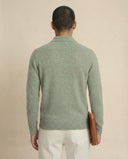 Man wearing the VAËL Solēn fine wool half-zip polo sweater