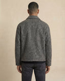 Man wearing the VAËL Vēron wool zip jacket