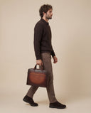 Man wearing the VAËL Solēn fine wool half-zip polo sweater
