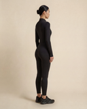 Model wearing the VAËL Nēva sculpted zip bodysuit