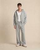 Man wearing the VAËL ORÉN full-zip hooded sweatshirt