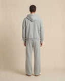 Man wearing the VAËL ORÉN full-zip hooded sweatshirt