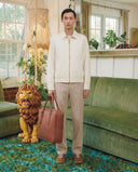 Man wearing the VAËL Ivō minimal zip jacket
