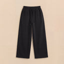 Man wearing the VAËL Kaïro wide-leg cotton jogger in heavyweight premium cotton