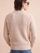 Man wearing the VAËL Lēon wool zip cardigan with ribbed collar