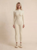 Model wearing the VAËL Nēva sculpted zip bodysuit