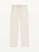 Man wearing the VAËL Seréno drawstring linen trousers