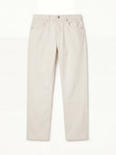 Man wearing the VAËL Leóndro straight-leg cotton trousers in white