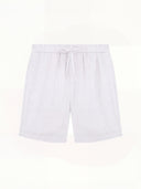 Man wearing the VAËL Soléo drawstring linen shorts