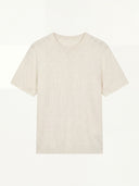 Man wearing the VAËL Bravía textured knit T-shirt in white