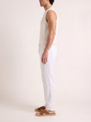 Model wearing the VAËL Rocío sleeveless knit top in white