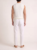 Model wearing the VAËL Rocío sleeveless knit top in white