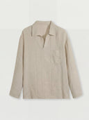 Man wearing the VAËL Solano open-collar linen shirt in beige