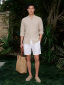 Man wearing the VAËL Soléo drawstring linen shorts