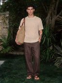 Man wearing the VAËL Cáleo open-knit boxy T-shirt