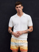 Man wearing the VAËL Alcázar rib-knit open-collar polo