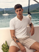Man wearing the VAËL Alcázar rib-knit open-collar polo