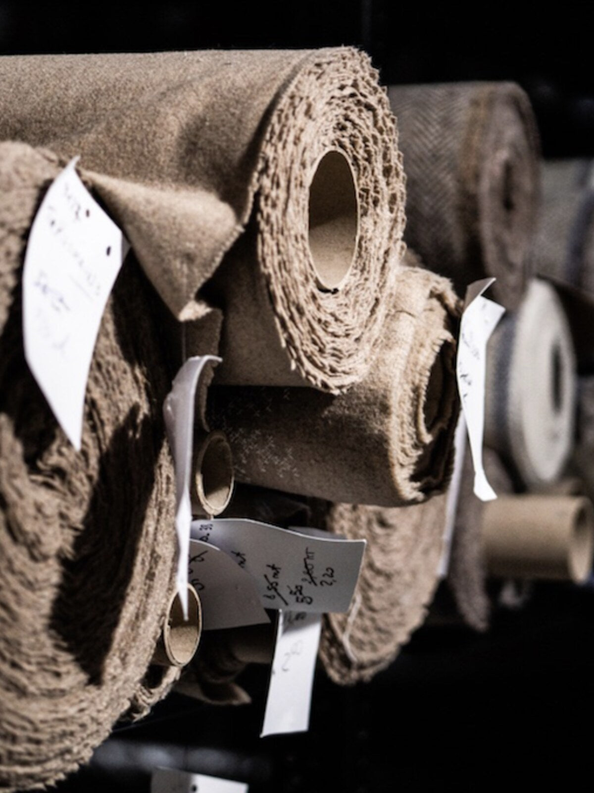Lengths of cloth on the roll, each with its mill ticket