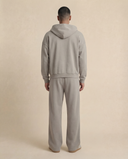 Man wearing the VAËL ORÉN full-zip hooded sweatshirt